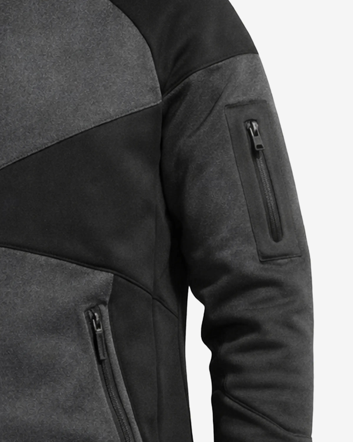 Close-up of a black and gray jacket with zippers on a white background