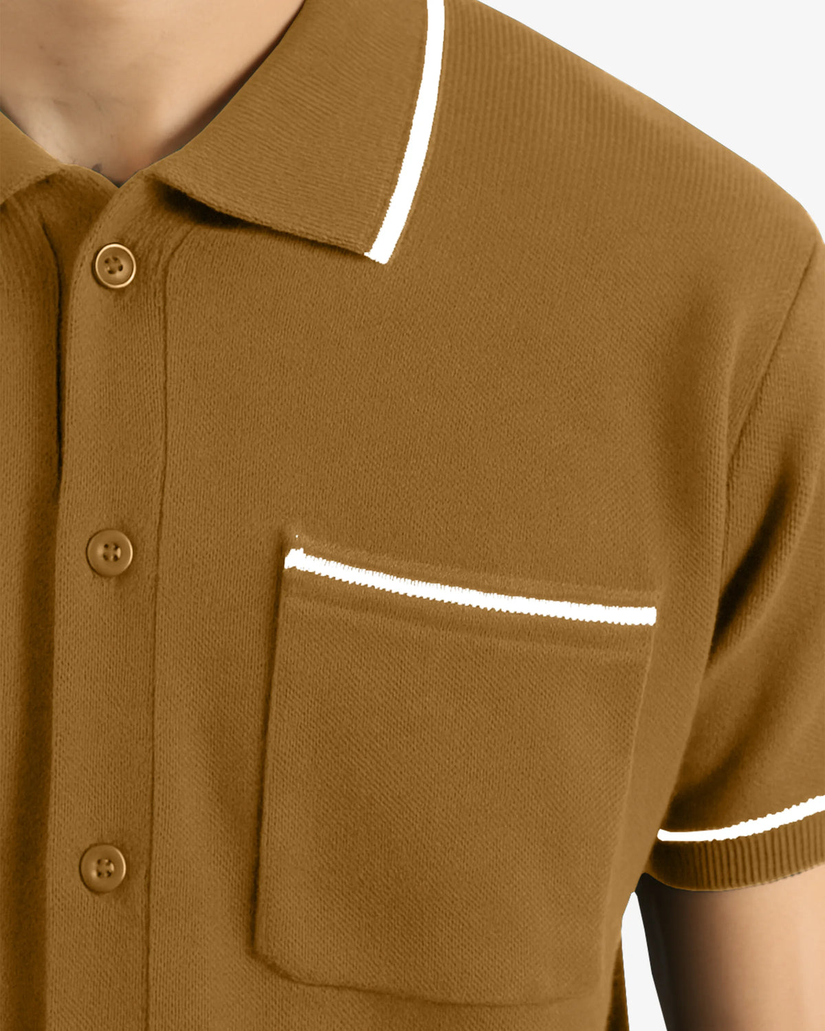 Brown shirt with white trim on a neutral background