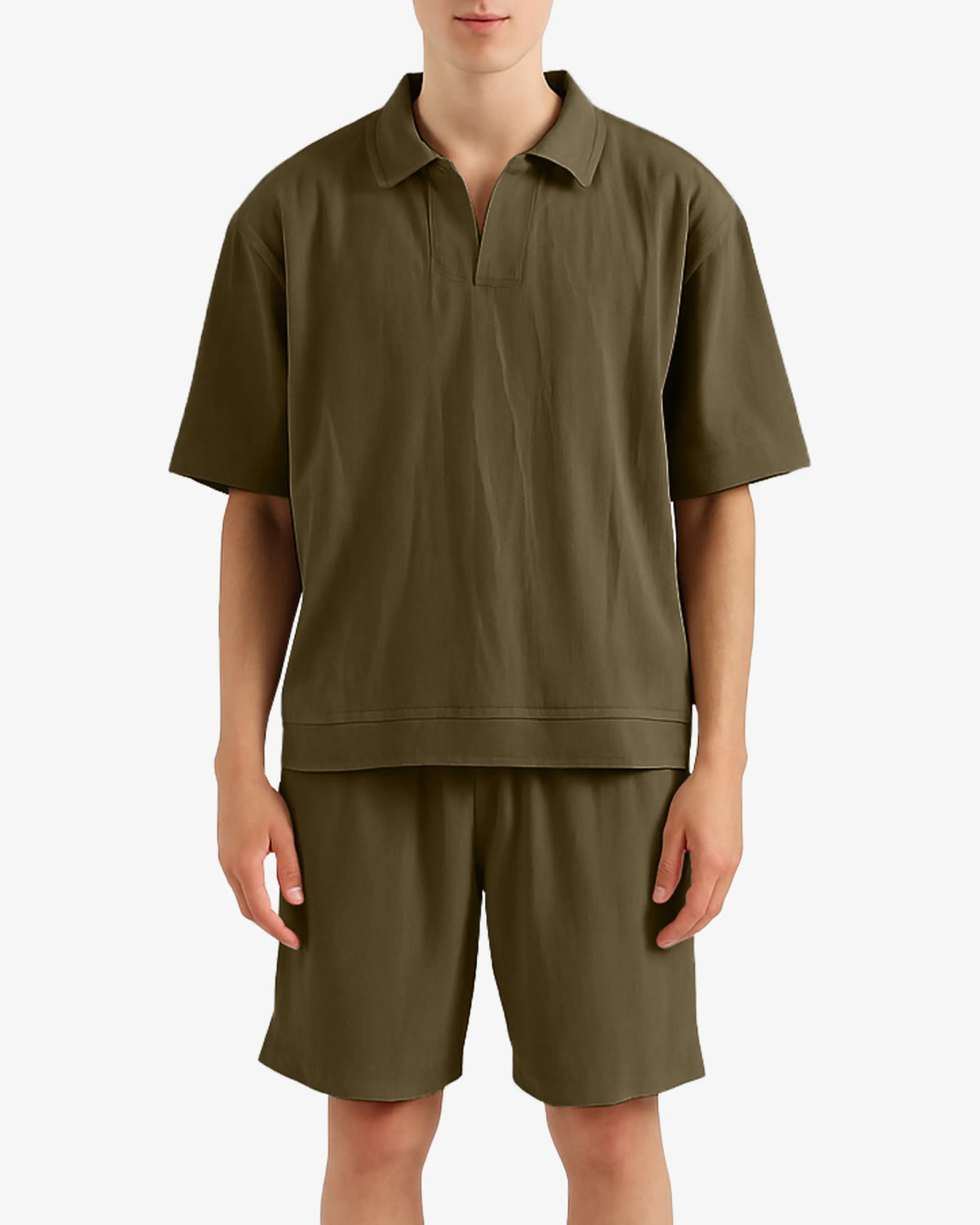 Person wearing a green polo shirt and shorts set on a white background