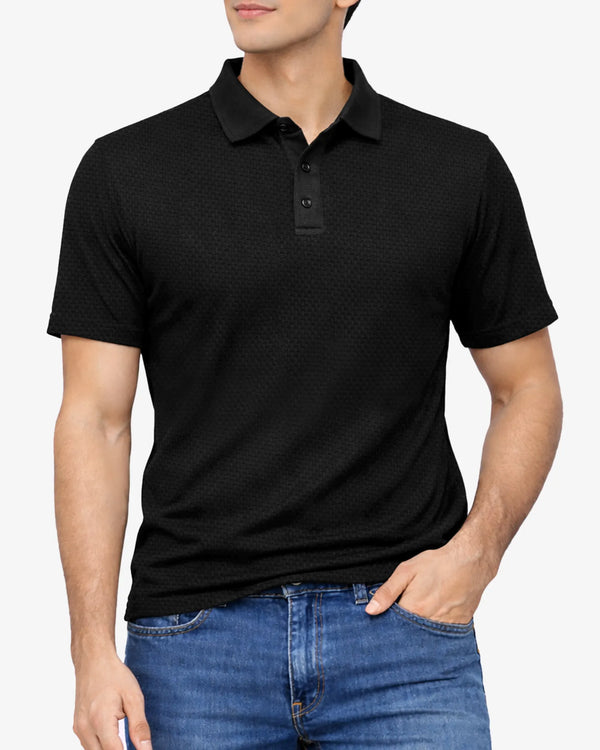 Person wearing a black polo shirt and blue jeans on a white background