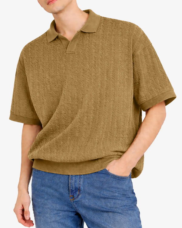Person wearing a brown polo shirt and blue jeans on a white background