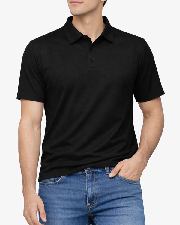Person wearing a black polo shirt and blue jeans on a white background