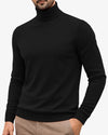 Black turtleneck sweater worn by a person on a light gray background