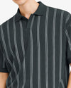 Black polo shirt with white vertical stripes on a plain background