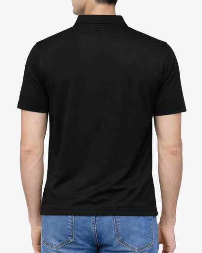 Black polo shirt worn by a person on a white background