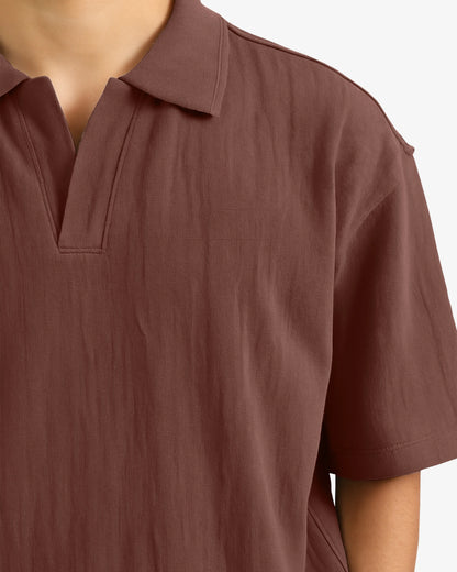 Brown polo shirt on a white background