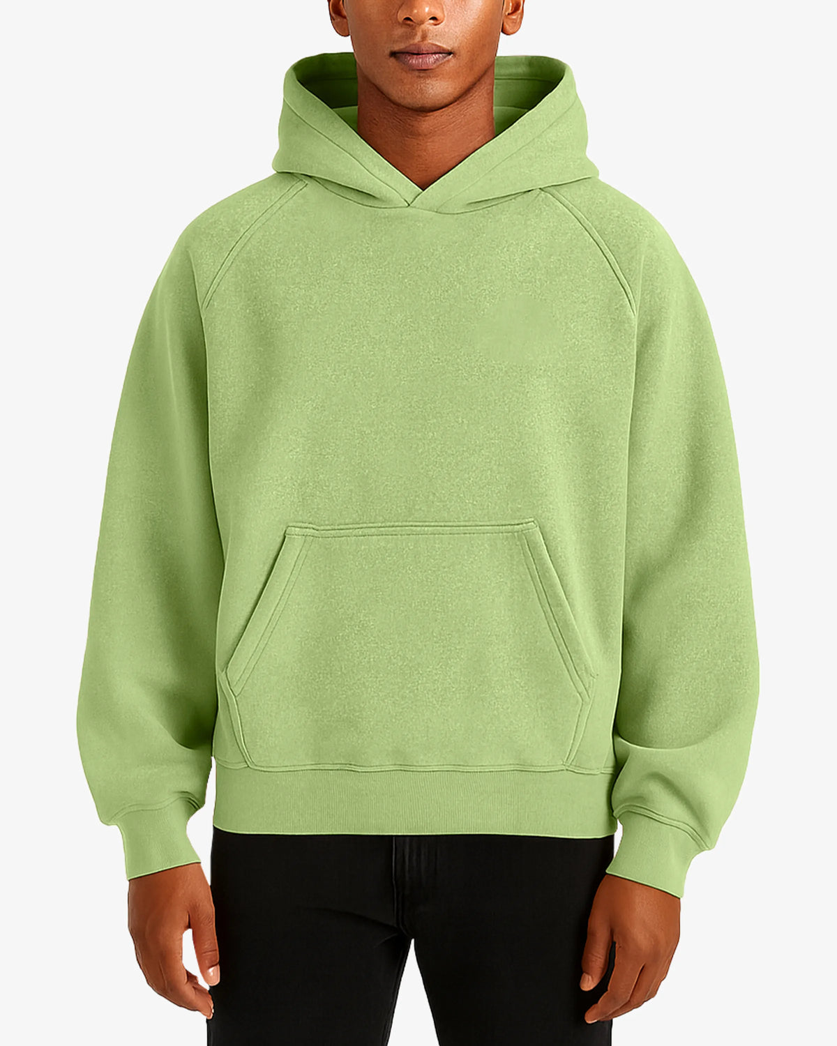 Person wearing a light green hoodie on a white background