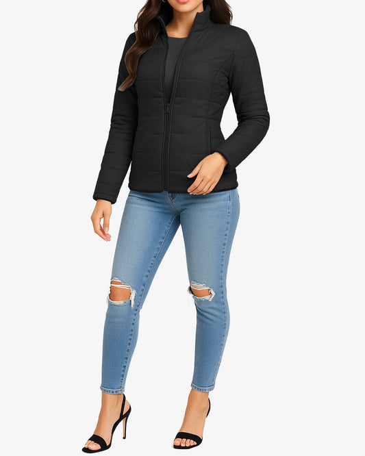 Person wearing a black jacket and light blue ripped jeans on a white background