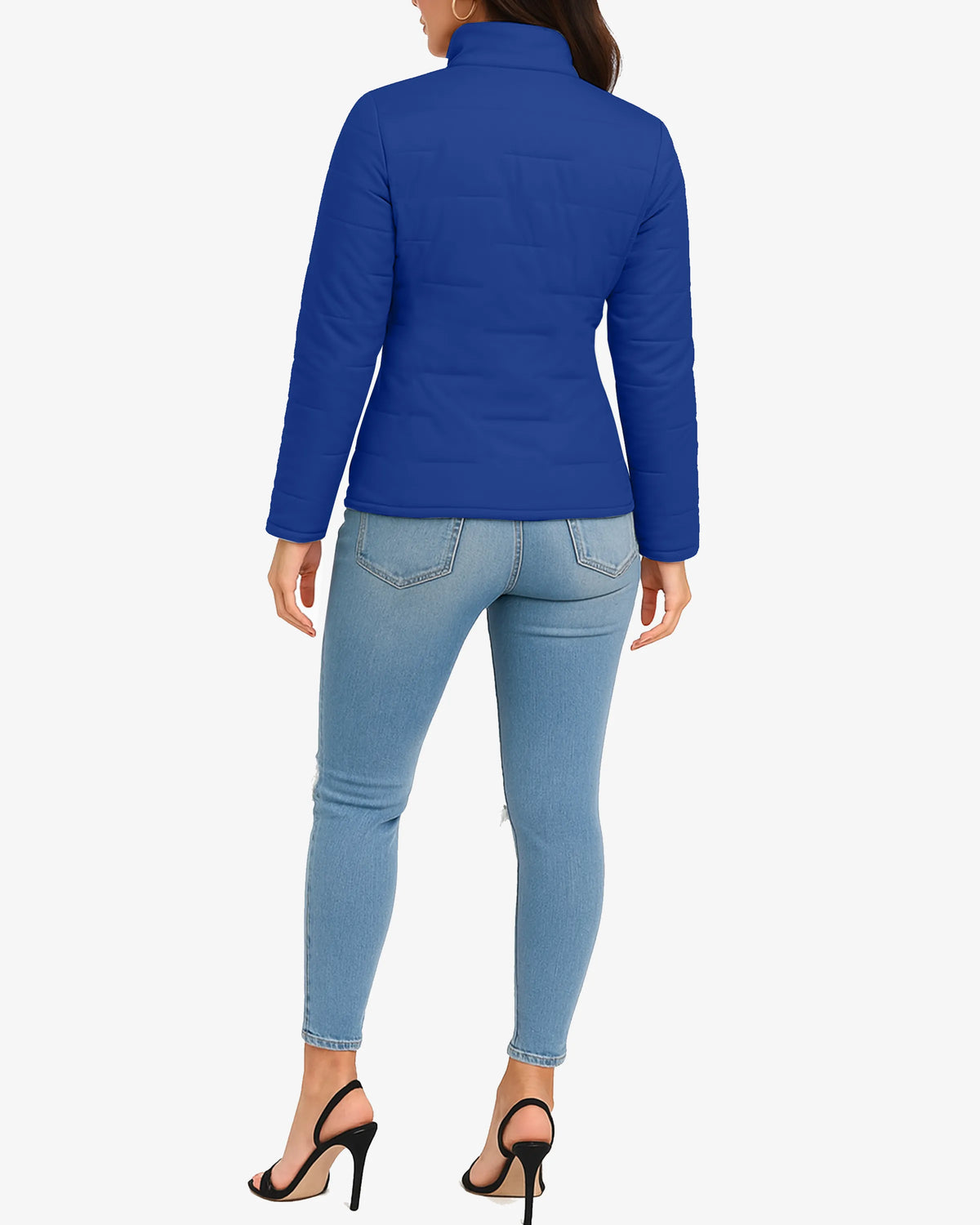Person wearing a blue jacket and light blue jeans on a white background