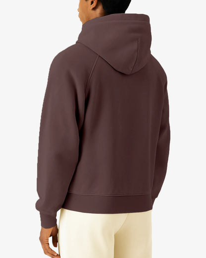 Person wearing a brown hoodie from behind on a white background
