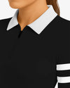 Close-up of a black shirt with white collar and sleeves on a mannequin.
