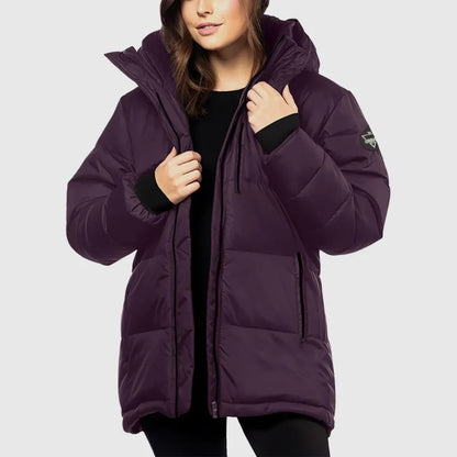 Purple puffer jacket worn by a person on a light gray background