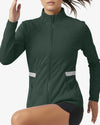 Green athletic jacket worn by a person on a white background